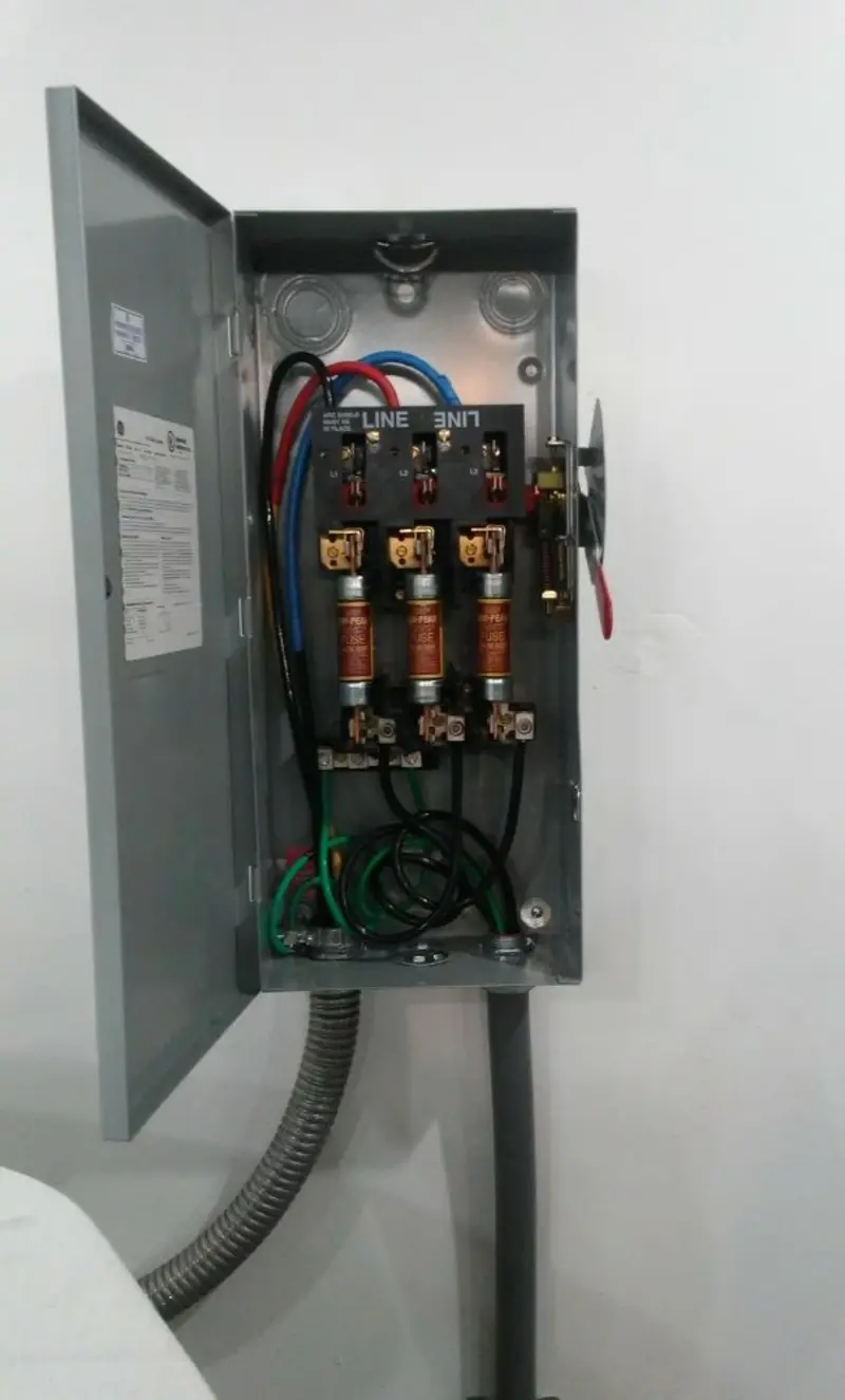 Three-phase disconnect switch installed for Smoke Detector Installation in Carroll