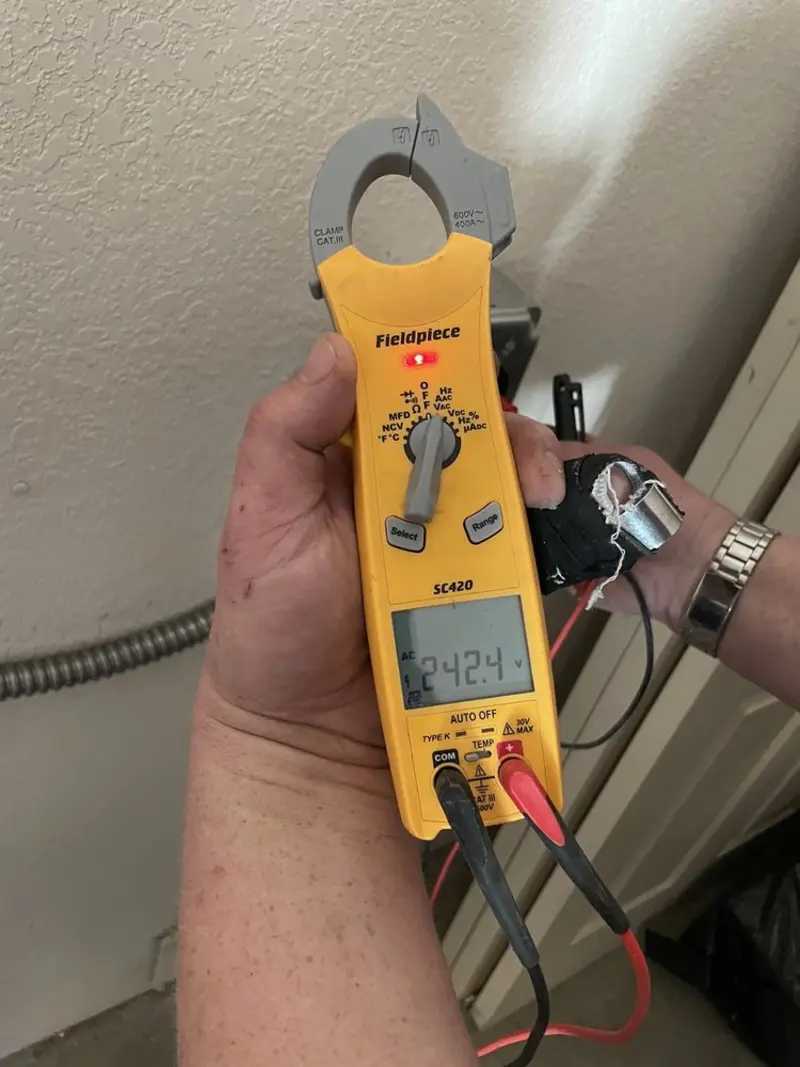 Voltage testing with clamp meter during Hot Tub / Pool Electrical Wiring in Carroll